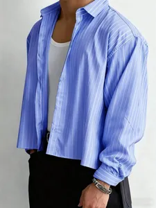 Detail view of men's blue striped oversized long sleeve shirt with a relaxed fit