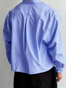Rear view of a premium blue striped long-sleeve shirt showcasing its relaxed fit.