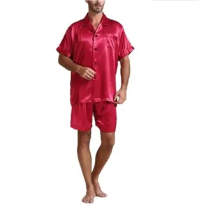 Men's red satin pajama set with short-sleeved button-down shirt and matching shorts.