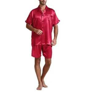 Men's red silk satin pajama set featuring short sleeve button-down shirt and shorts