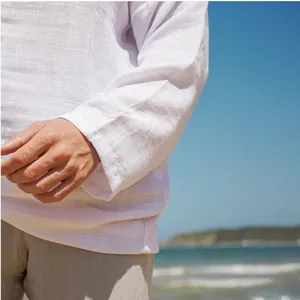 Close-up detail showing the breathable linen texture of a white men's summer shirt