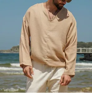 High-quality detail of men's loose fit beige linen shirt perfect for summer beach vacation