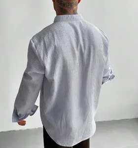 Back view of men's blue striped seersucker shirt with casual stand collar design