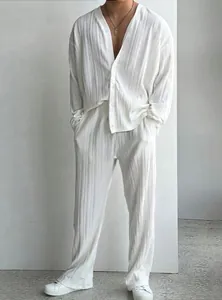 Premium men's white pleated two-piece set with long-sleeve button shirt and pants