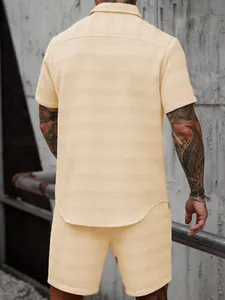 Back view of men's beige jacquard waffle texture short sleeve shirt and shorts set