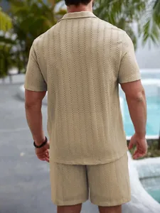 Back view of men's beige textured short sleeve shirt and shorts set for vacation.