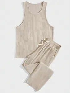 Detailed texture of beige men's ribbed tank top and drawstring pants set