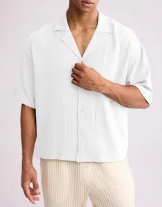 Casual men's loose white textured shirt with short sleeves and a stylish lapel collar design