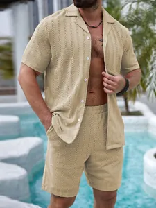Detailed view of khaki men's textured knit shirt and shorts set on model by a pool area