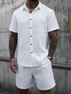 Detailed view of white jacquard textured short sleeve shirt and shorts set for men