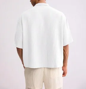 Back view of men's white short-sleeved shirt featuring premium crinkle textured fabric