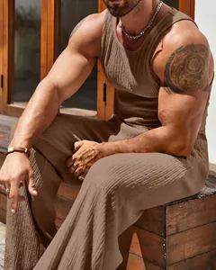 Detailed view of men's brown ribbed tank top and matching wide-leg casual pants set