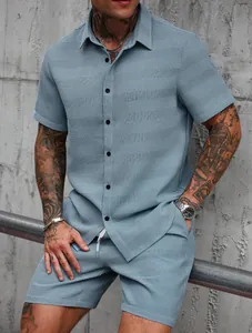 Detail of blue jacquard short-sleeve shirt and shorts set for men's summer vacation