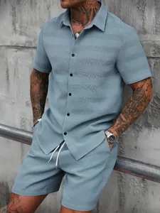 Close-up of men's summer jacquard shirt and shorts set with textured fabric detailing
