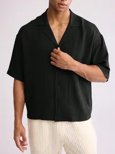 Mens black textured short sleeve camp collar shirt in a relaxed fit for casual wear