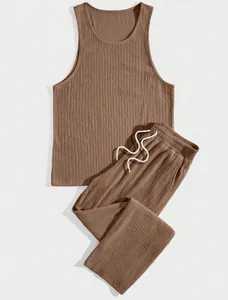 Detail view of men's brown textured loungewear set featuring drawstring elastic pants.