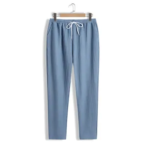 Pantalon décontracté bleu texturé pour homme avec taille à cordon et poches sur cintre