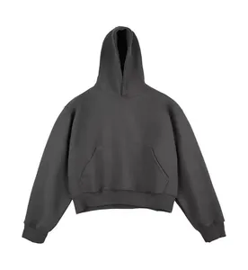 Detailed shot of the heavyweight cotton material on boxy cropped hooded sweatshirt.