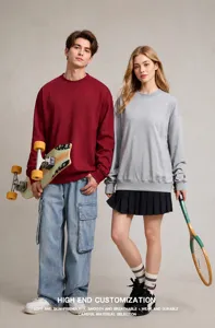Couple wearing oversized 380g heavyweight cotton crewneck sweatshirts in grey and red