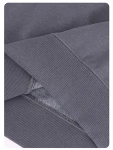 Detailed macro view of gray washed heavy French terry sweatshirt fabric and ribbing