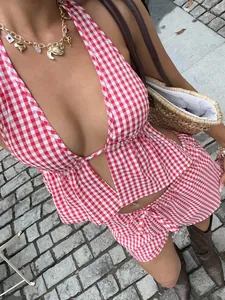 Detailed view of the sexy red and white gingham tie-up halter two-piece set for women