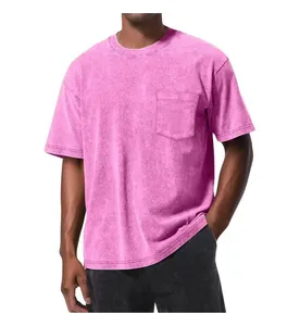 Close-up detail of vintage pink acid wash oversized pocket T-shirt on a male model