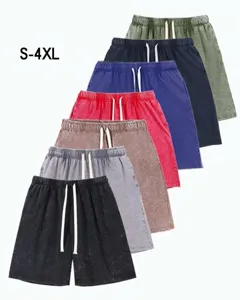 Detailed view of men's vintage washed cotton drawstring shorts in various colors