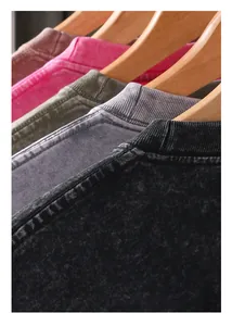 Detailed view of heavy weight washed distressed cotton long sleeve T-shirt necklines