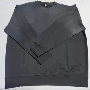 Vintage washed heavy crewneck sweatshirt featuring an oversize fit in charcoal gray