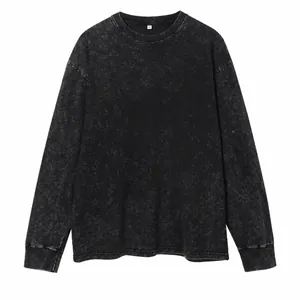Vintage acid-washed black long-sleeve t-shirt made of heavy weight cotton fabric