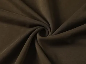 Vista macro de tela de algodón marrón oscuro de 350g que muestra textura de calidad
