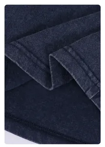 Macro detail of washed cotton vintage shorts showing premium fabric texture and stitching
