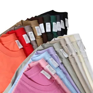 Premium heavyweight cotton unisex t-shirts in multiple colors with visible neck labels