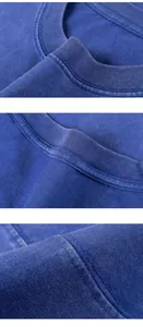 Gros plan sur le col rond côtelé et la texture du coton délavé du t-shirt épais