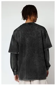 Back view of a vintage black acid-washed faux two-piece long-sleeve T-shirt for men