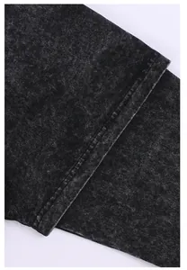 Close-up detail of vintage washed grey cotton fabric featuring a faux layered double hem