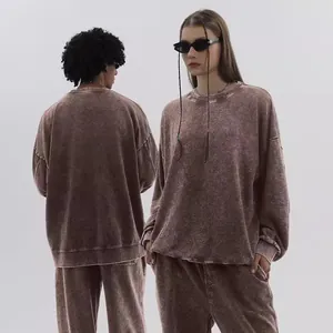 Oversized vintage acid-wash sweatshirt and joggers set in brown for men and women.