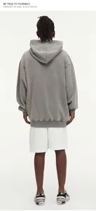 Back view of a vintage grey washed oversized hoodie with a comfortable streetwear fit