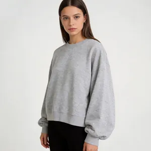 Women's grey cropped crewneck sweatshirt with balloon sleeves and loose fit style
