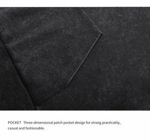 Close-up detail of the three-dimensional patch pocket on a vintage washed hooded sweatshirt