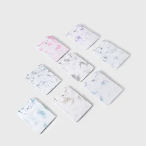 Collezione di t-shirt a maniche corte in cotone tie-dye in vari colori e fantasie