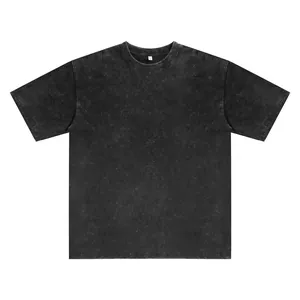 Vintage acid washed black heavyweight cotton t-shirt with distressed texture detail