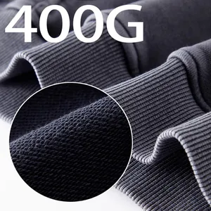 High-quality heavyweight 400g vintage washed cotton hoodie fabric detail with ribbed cuffs