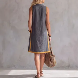 Back view of a stylish grey sleeveless linen dress with yellow trim in relaxed fit.
