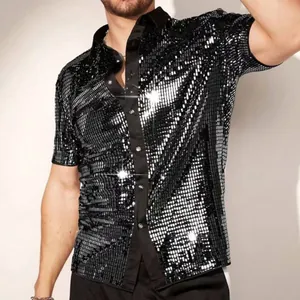 Detail of men's black sequin short sleeve shirt showing shiny texture and contrast collar