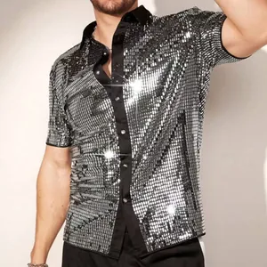 Detail view of silver sequin short-sleeved shirt with black patchwork collar design