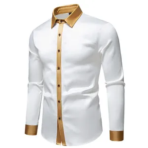 Detailansicht eines weißen Herrenhemds mit eleganten goldfarbenen Satin-Besätzen.