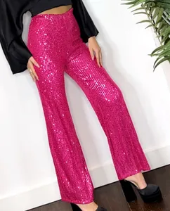 Close-up detail of vibrant hot pink sequined straight-leg pants for festive parties and events.