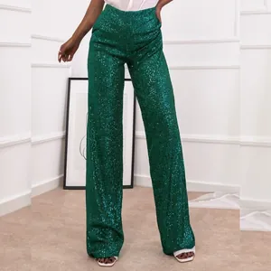 Detailed view of the emerald green sequined high-waisted wide leg fashion trousers