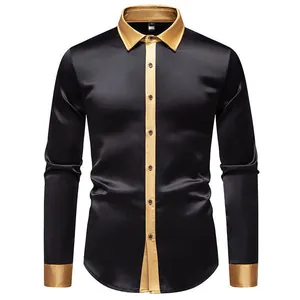 Detailansicht eines schwarzen Satin-Herrenhemdes mit eleganten goldenen Kontrastbesätzen